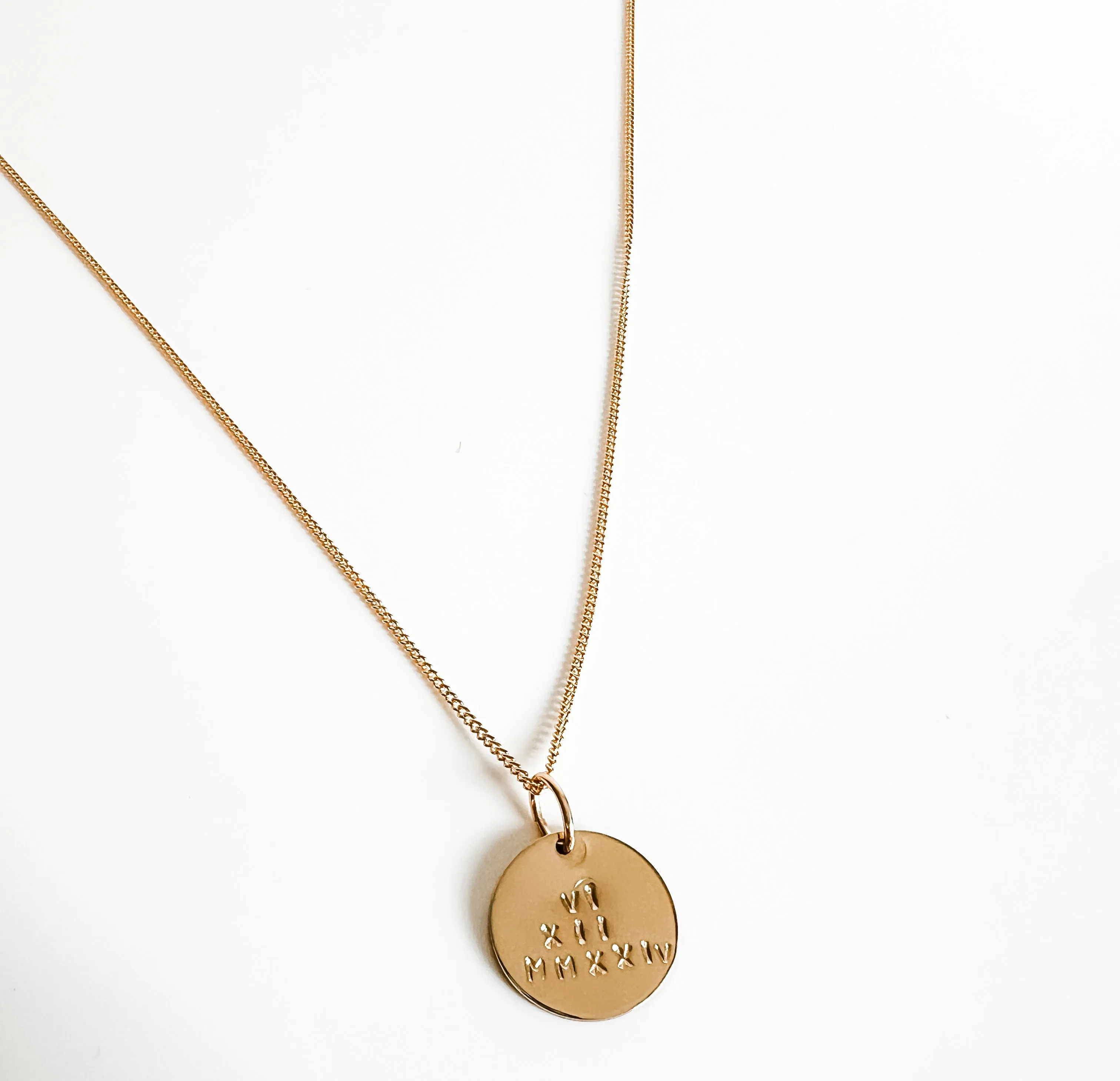 Dani disc Roman numerals