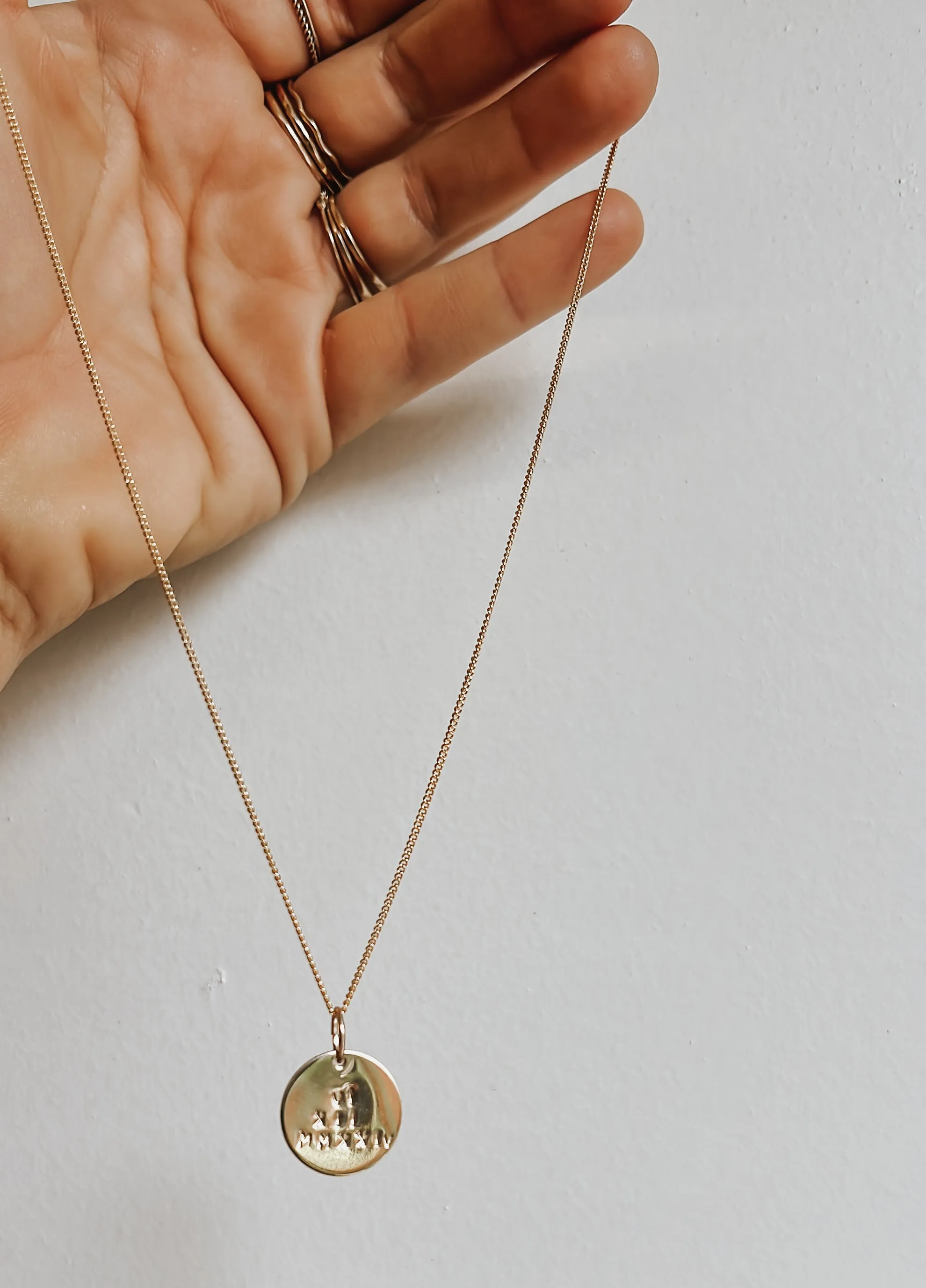 Dani disc Roman numerals