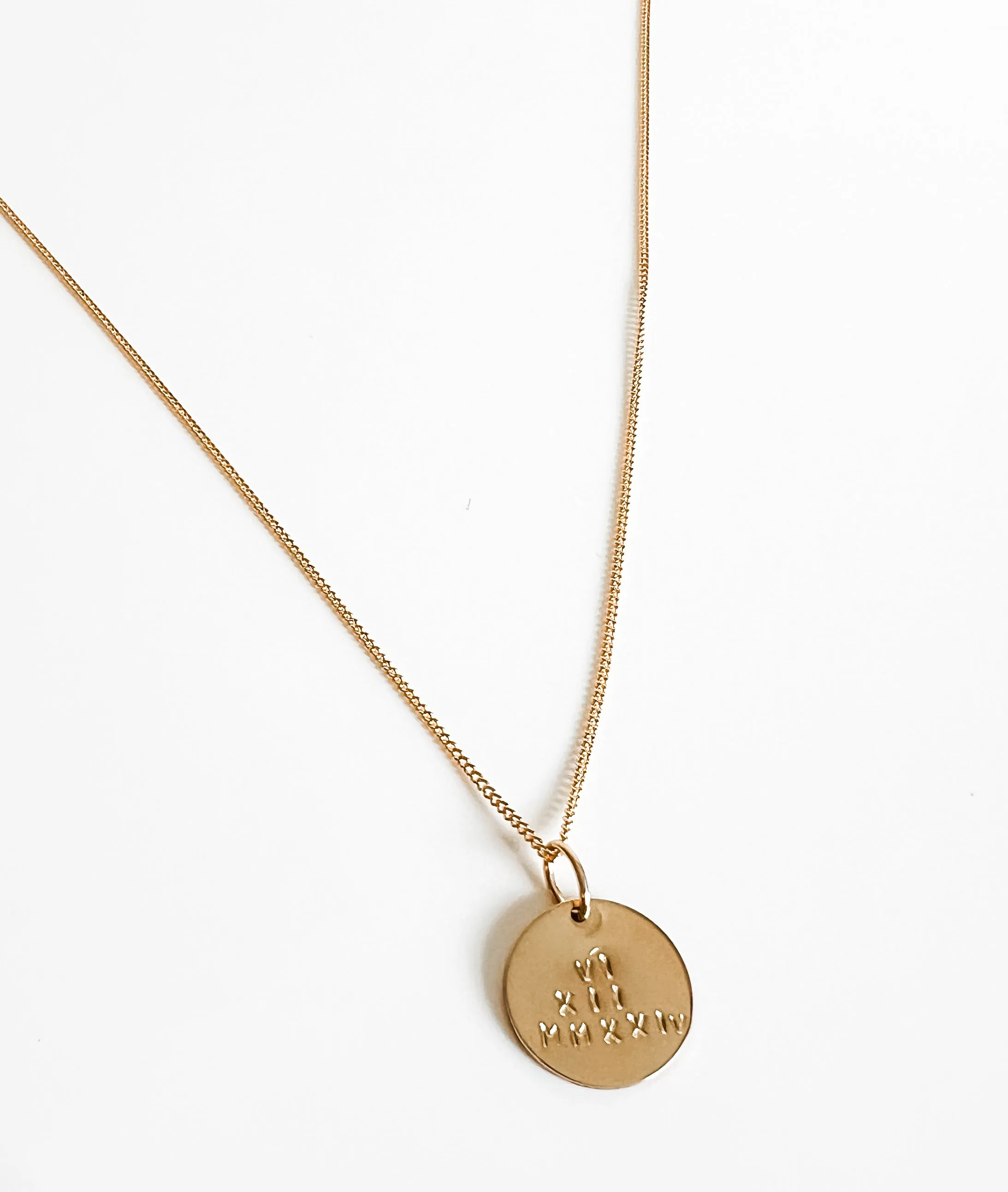 Dani disc Roman numerals