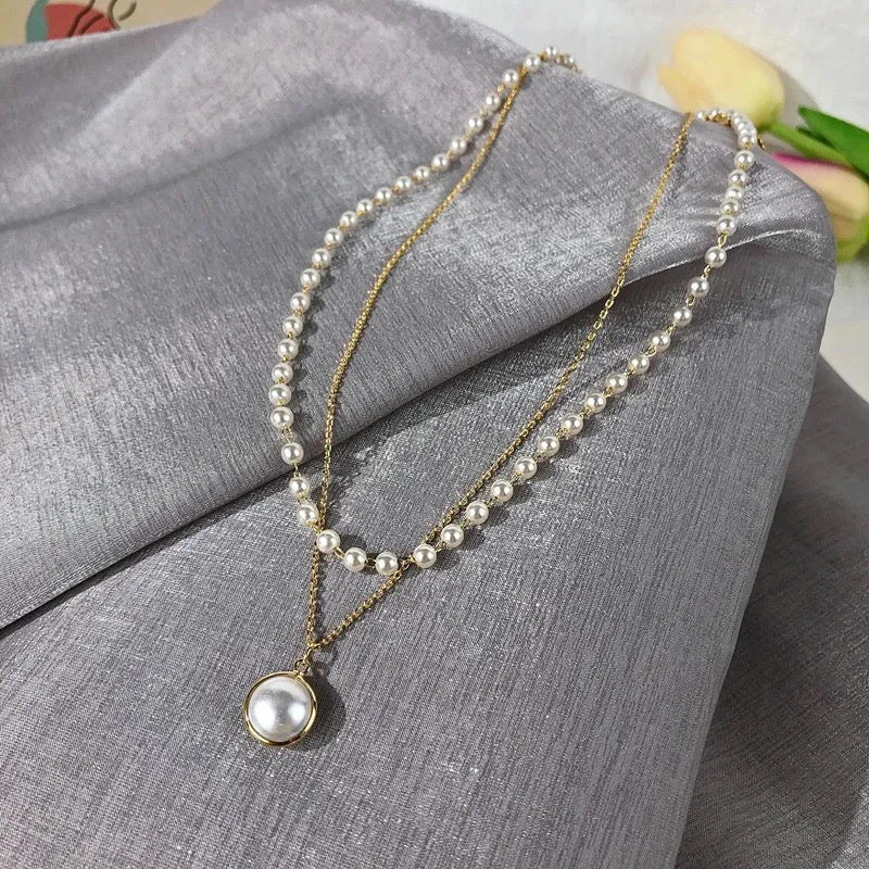 Pack Of 2 Pearl Layered Beads Half Moon Earth Pendant