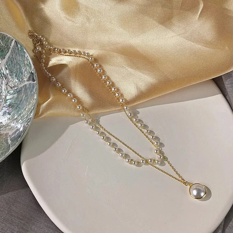 Pack Of 2 Pearl Layered Beads Half Moon Earth Pendant