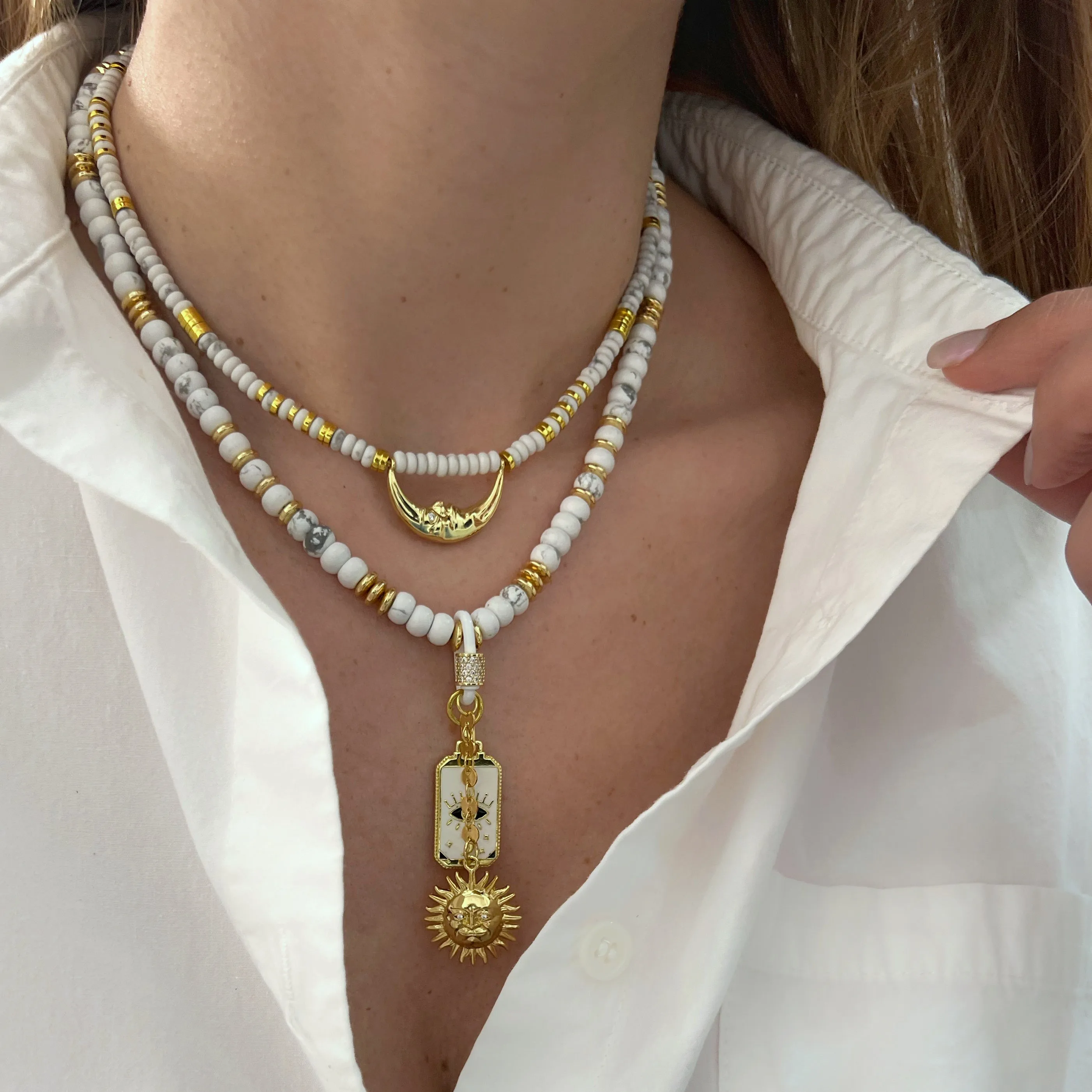 Vana White Moon and Sun Necklaces