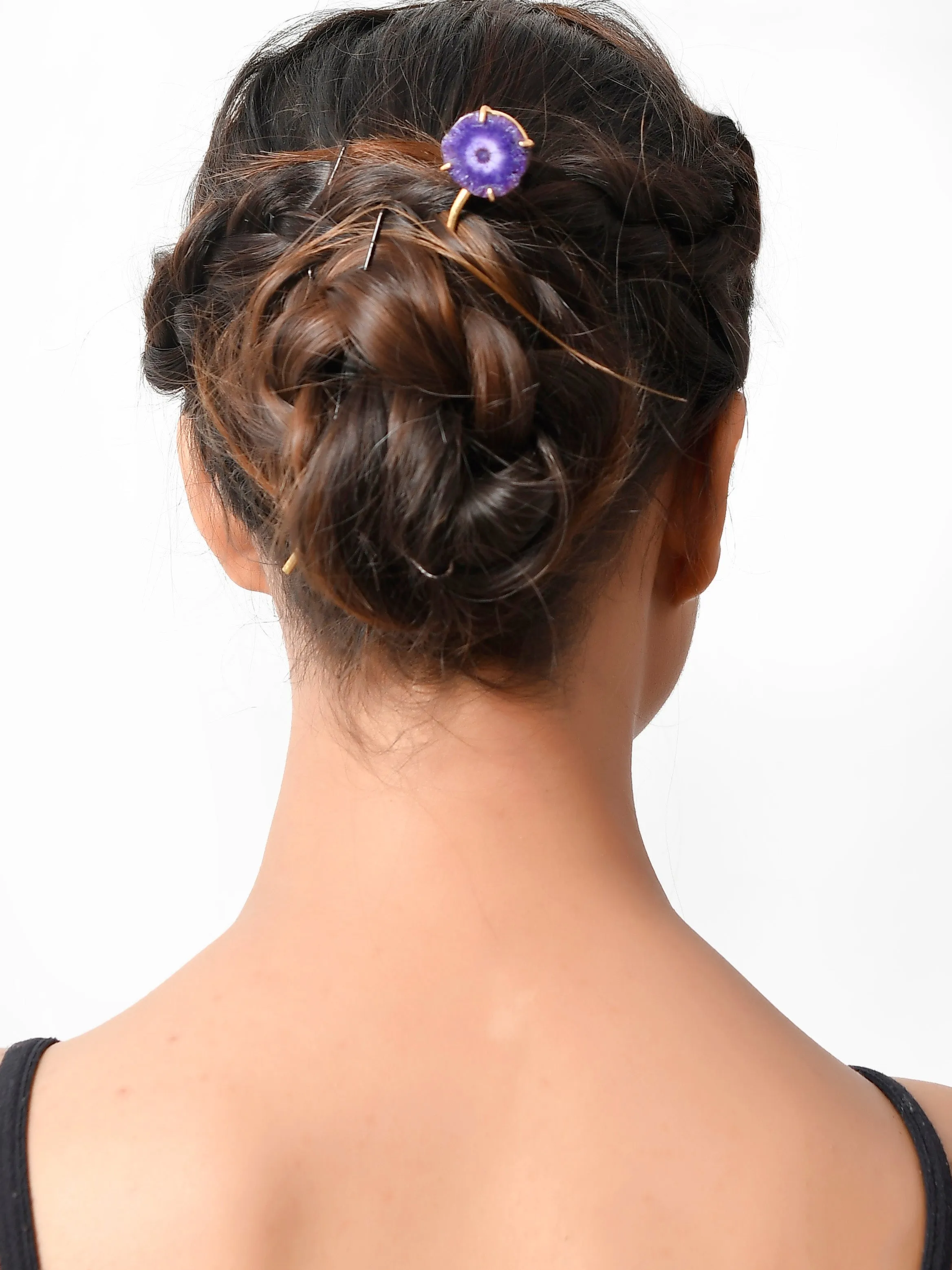 Women gold toned hairstick.