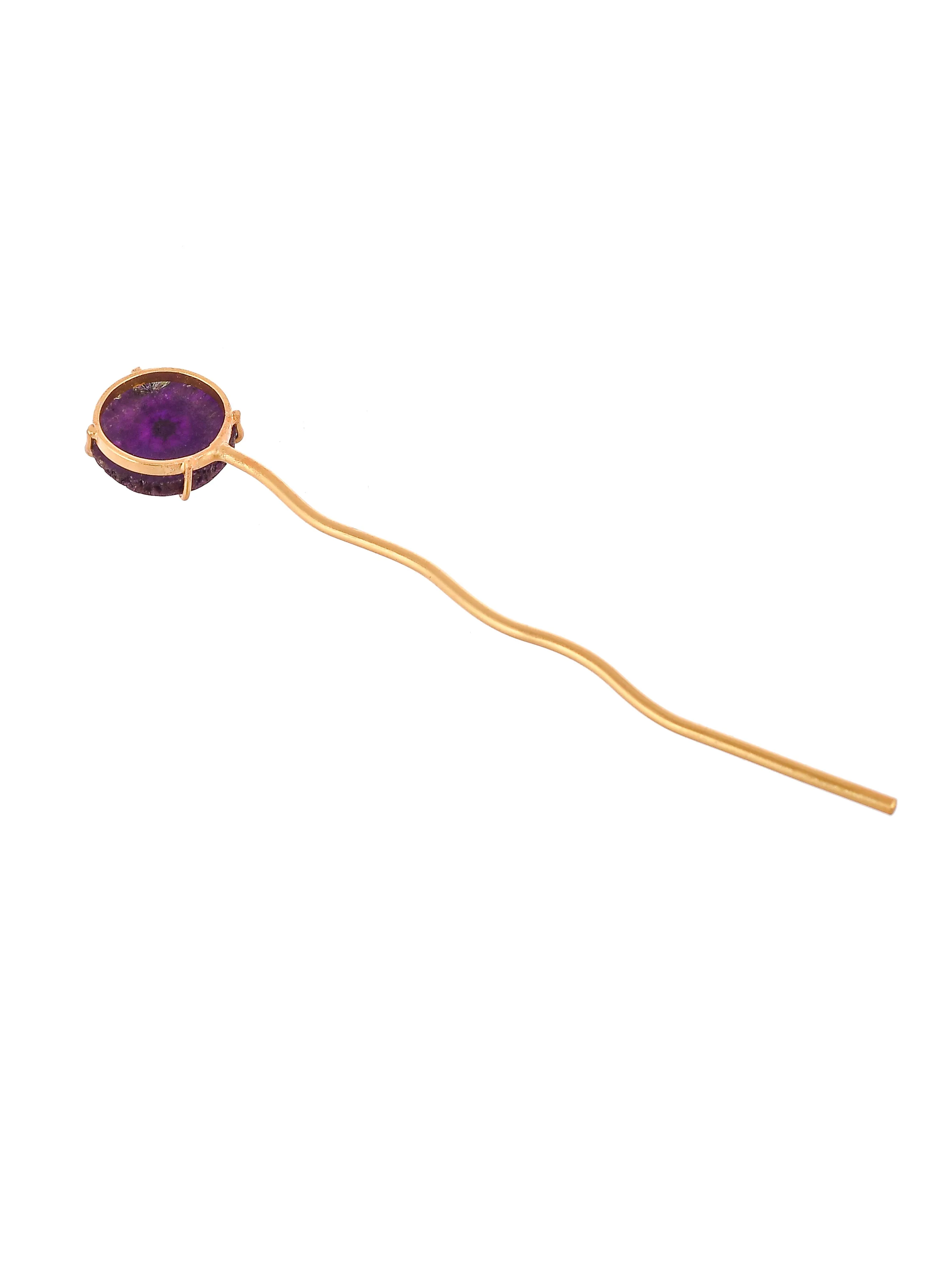 Women gold toned hairstick.