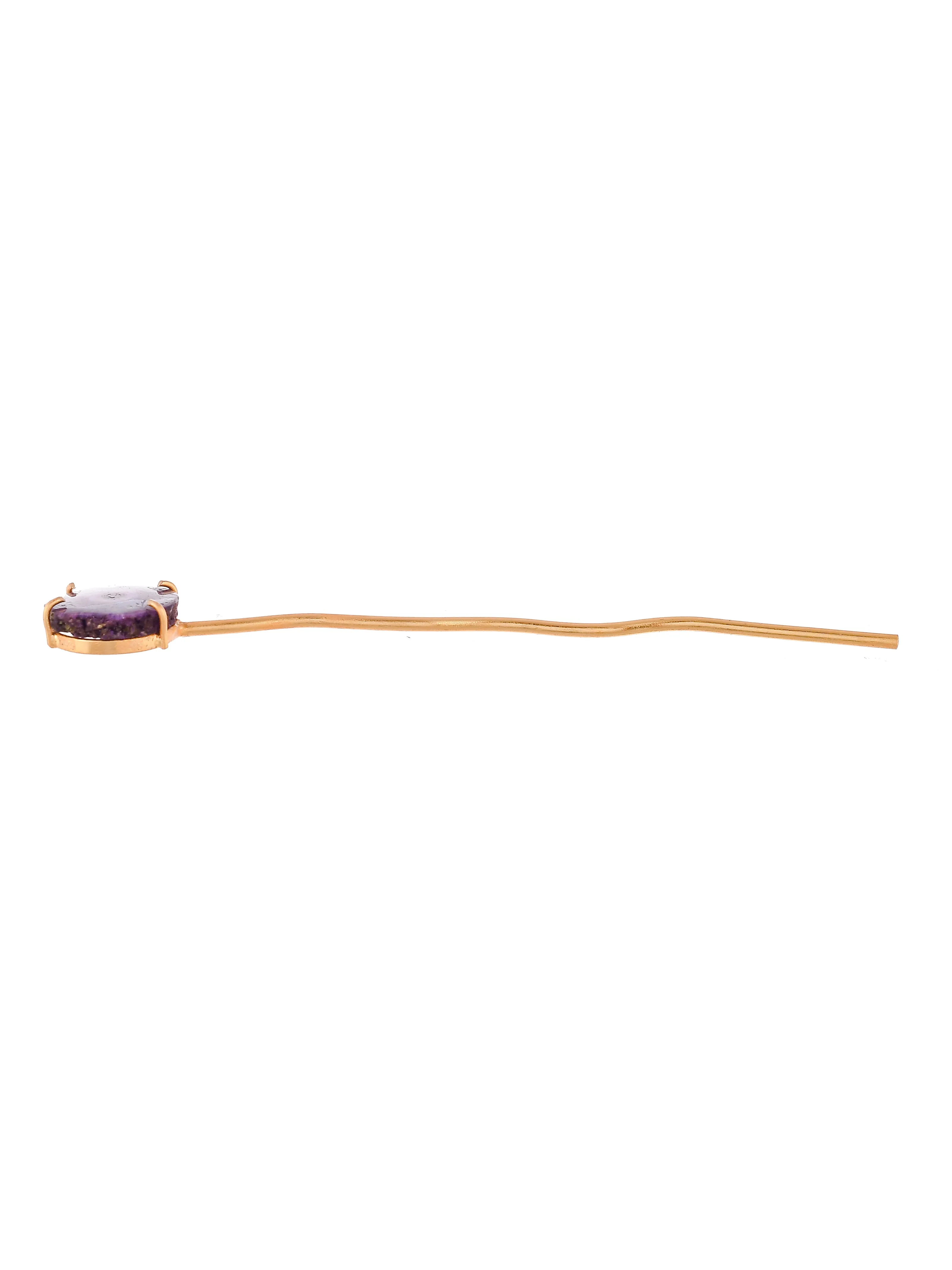 Women gold toned hairstick.