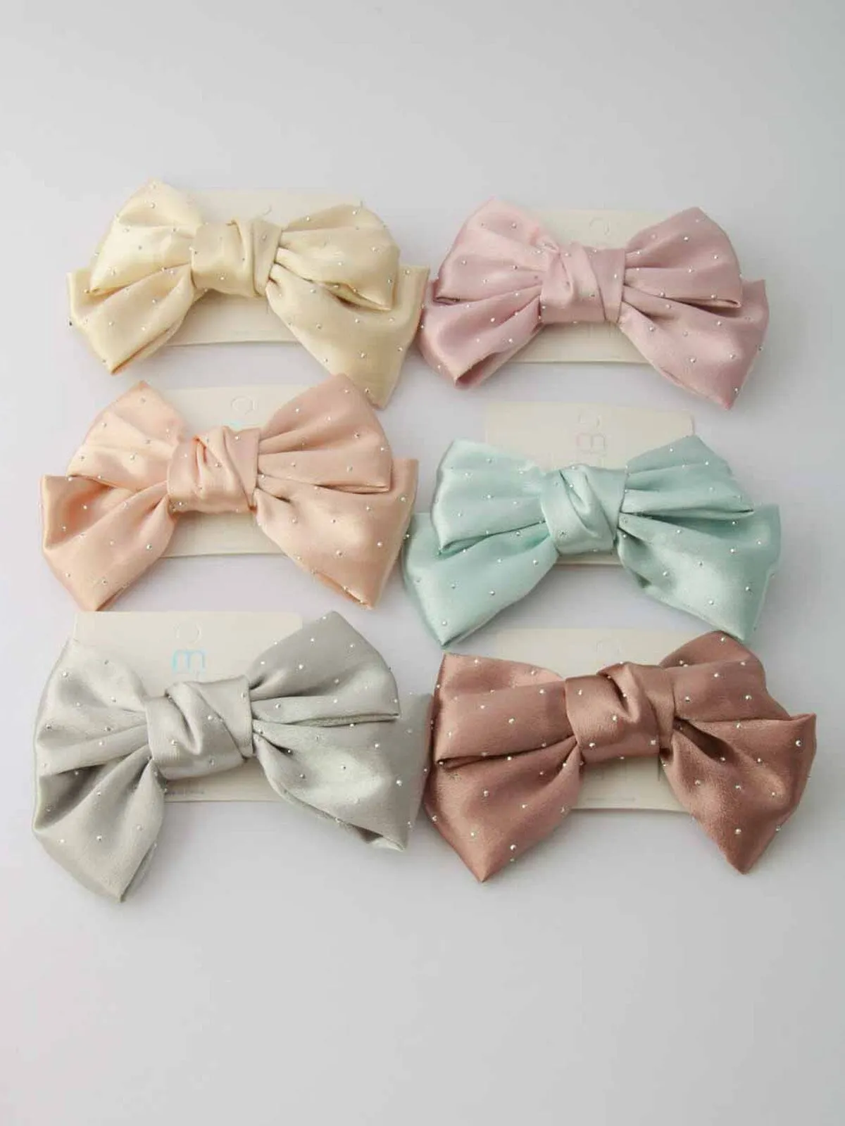 WOMEN'S ASSORTED COLORS BOW W/STUDS HAIR CLIPS